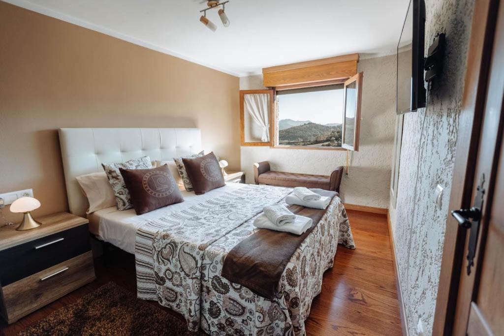 Apartamentos El Coritu Nieda Luaran gambar